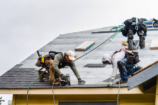 Professional Gutter Installation technician working in Ione, WA